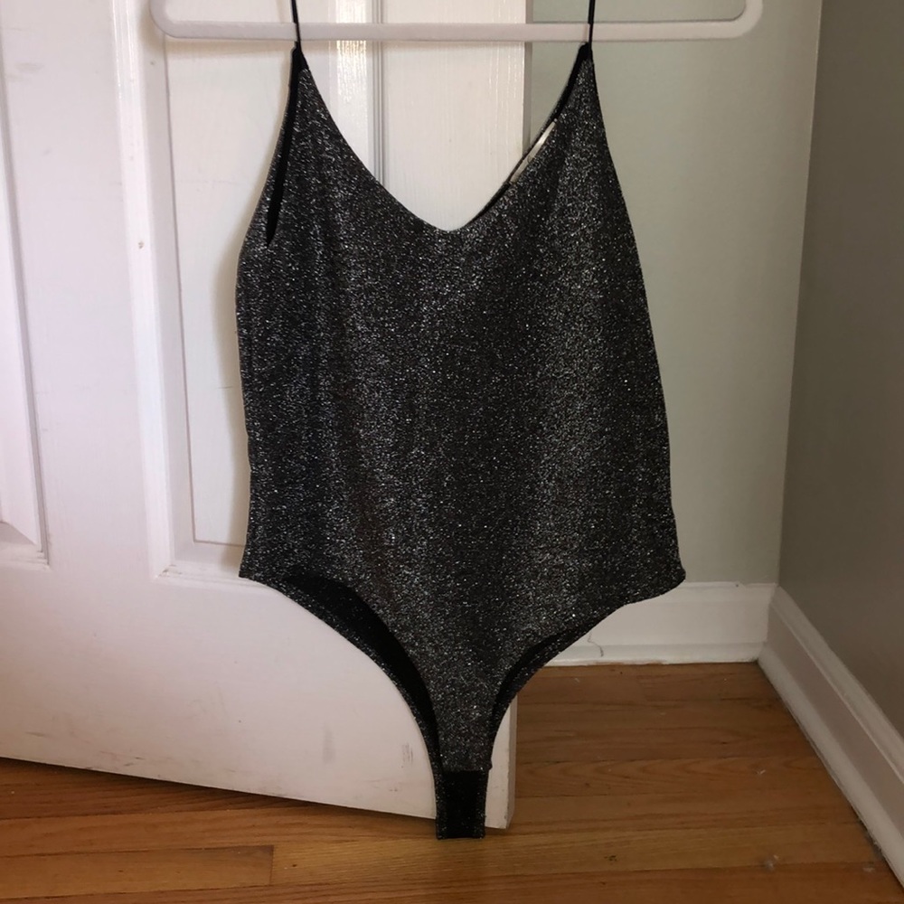 Sparkly silver and black body suit